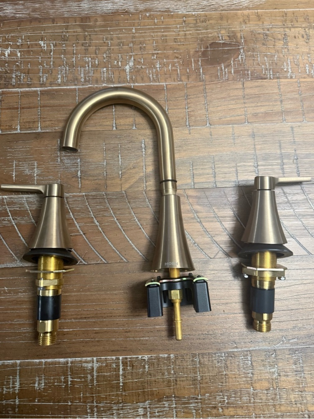 Moen Mikah Two Handle Widespread Bathroom faucet in bronzed gold